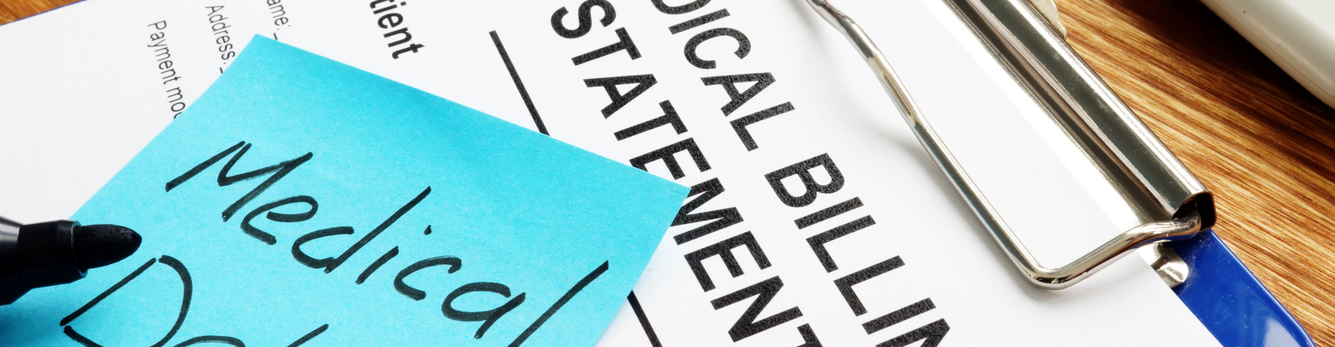 Medical debt with medical billing statement with clipboard