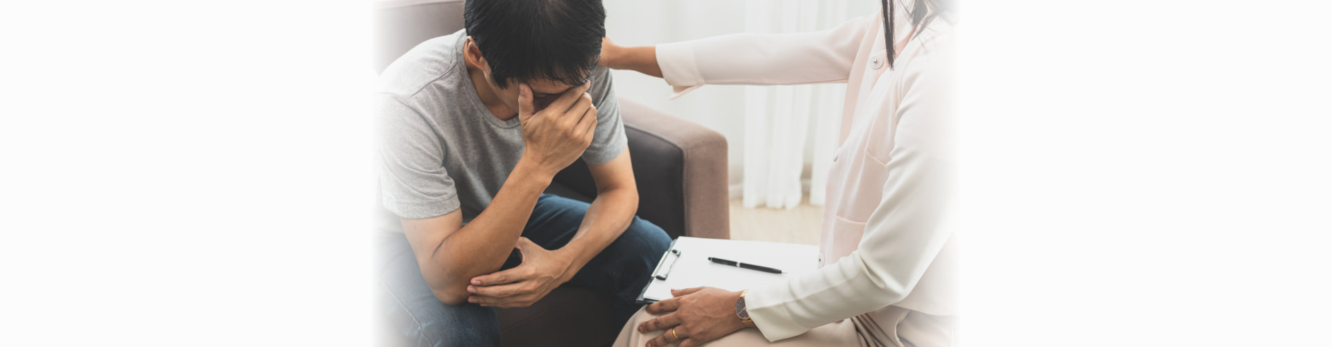 A professional woman comforting her client