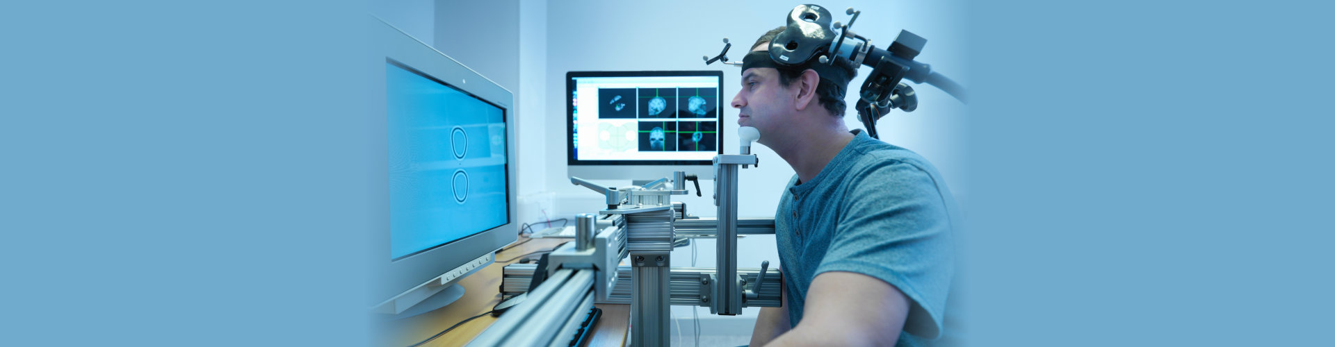 Patient in transcranial magnetic stimulation (TMS) experiment
